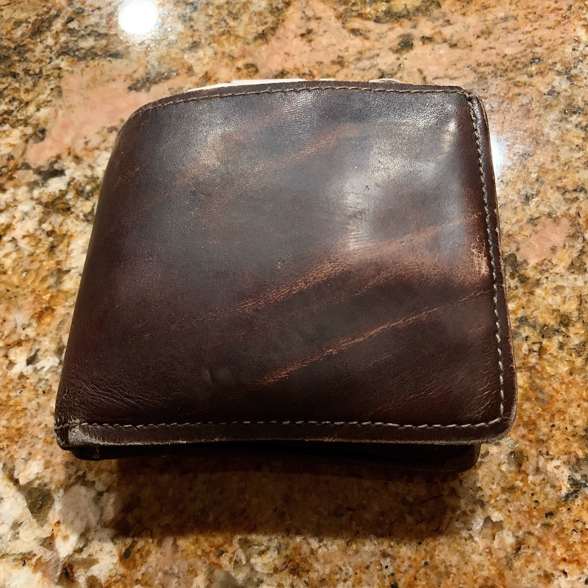 example: 8 year old wallet showing no signs of breakdown